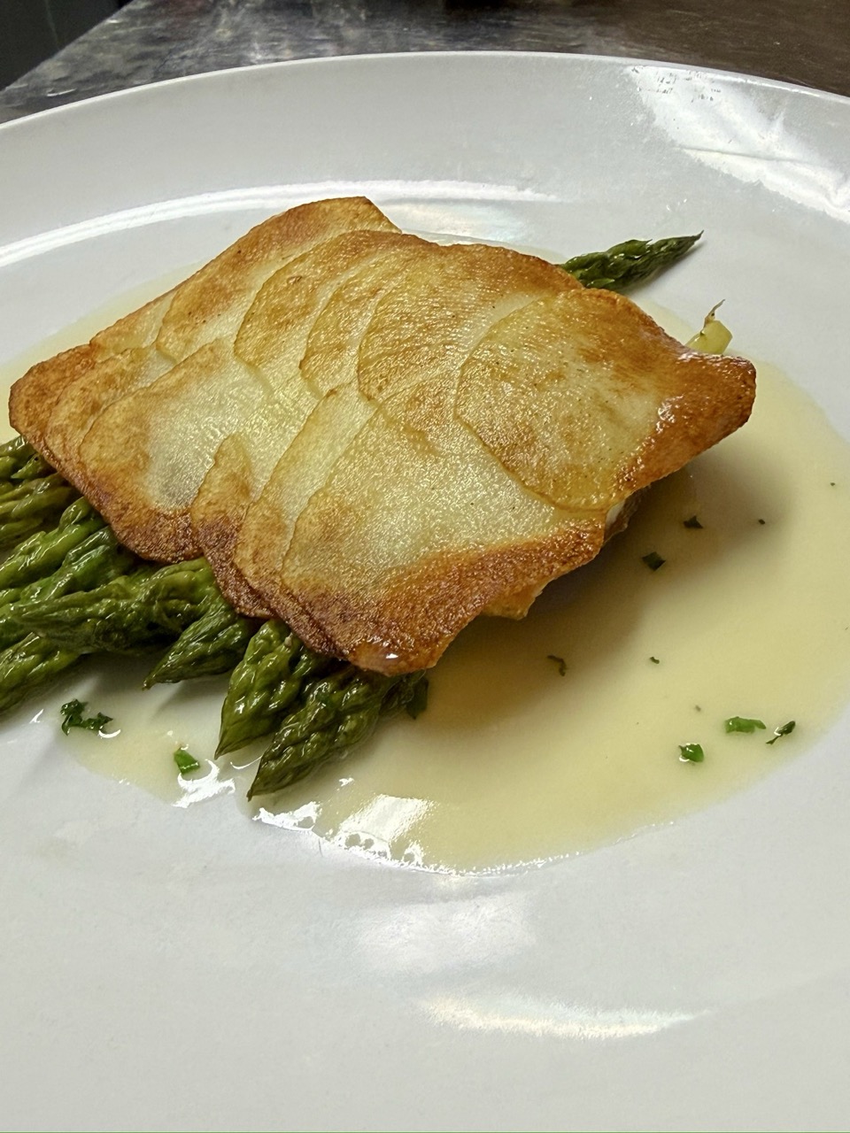 Branzino in potatoes crust